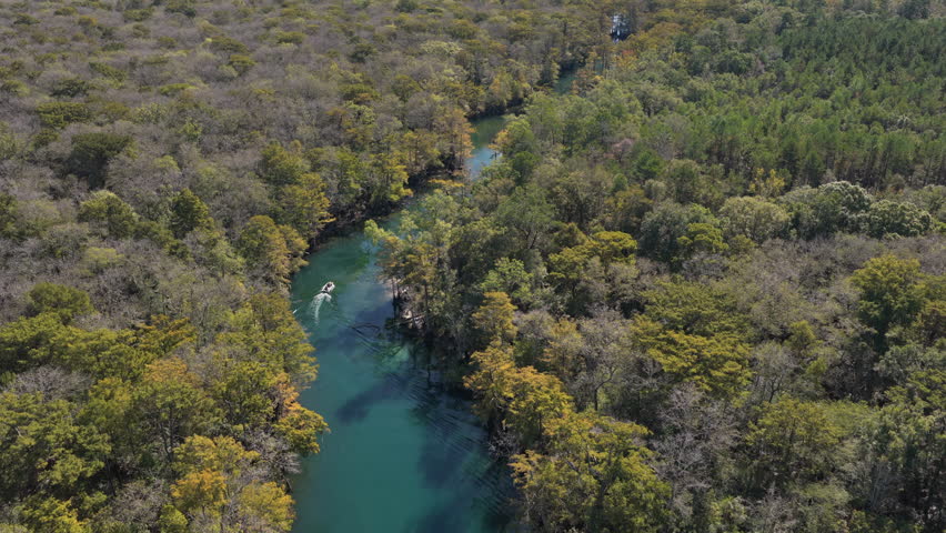 Sailing On The River Of Morrison Springs County Park In Florida, United States. Aerial Drone Shot