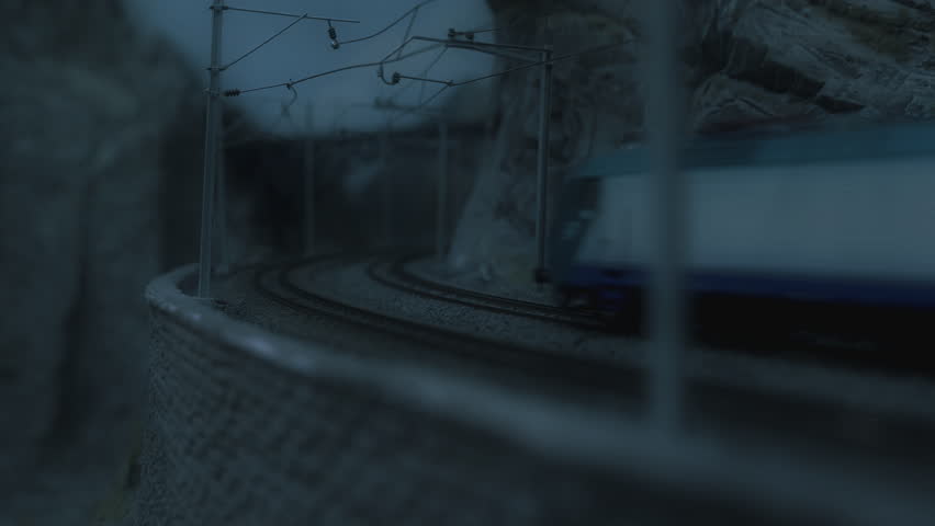 High speed Alpine train at night going through a mountain tunnel