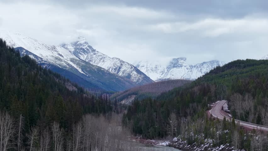 Aerial view of Glacier National Park mountains along Flathead River, Montana