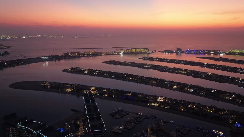 Palm Jumeirah artificial island in Dubai after sunset, United Arab Emirates