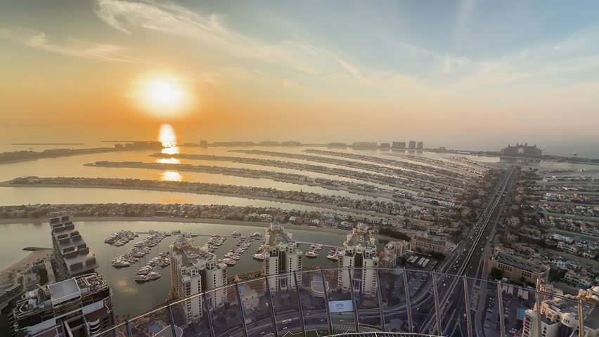 Panoramic view of Palm Jumeirah island at sunset in Dubai, United Arab Emirates