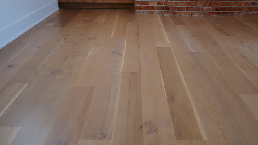 Element of the modern home Interior, wooden floor after the repair, Close up move camera shot