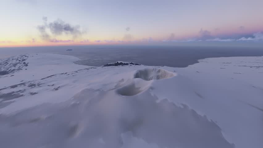 3D - Sunrise aerial drone view of the snow at Mount Erebus. Ross Island. Antarctica