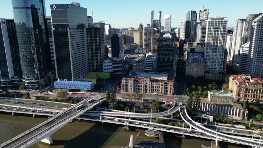 Brisbane Australia skyline from above featuring skyscrapers and corporate towers on the riverbank, dynamic urban cityscape and tourism concept