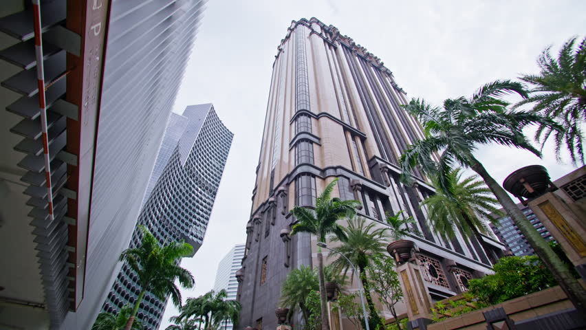 Urban skyline of downtown Singapore showcasing modern corporate buildings palm avenues and thriving business metropolis in Asia