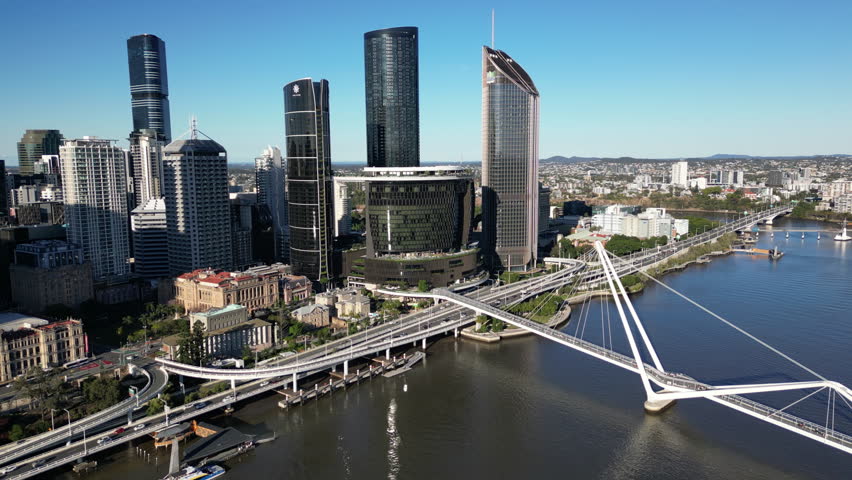 Scenic aerial cityscape of Brisbane Australia showing modern architecture skyscrapers and financial center near the riverfront