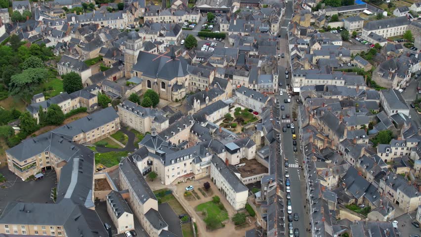Aerial view of the Old town of of the city Bauge-en-Anjou on a cloudy day in summer in France