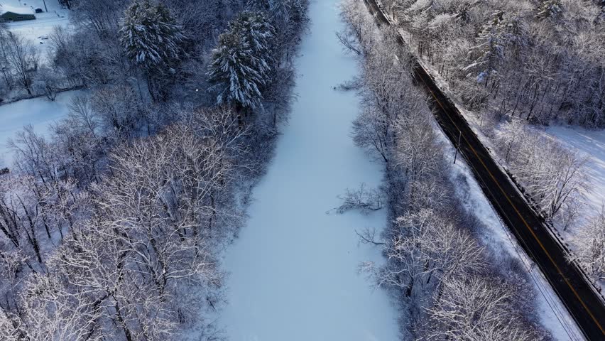 Winter aerial view featuring the Lamprey River upstream of Wadleigh Falls in Lee, New Hampshire