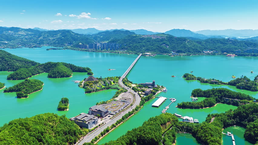 Scenic aerial view of turquoise water and green islands at Thousand Island Lake in Chun