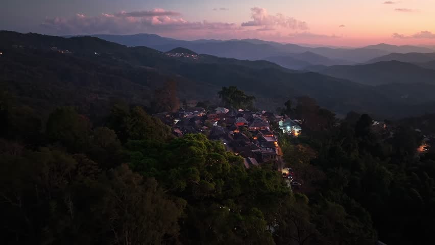 Wengji Ancient Village at sunset and blue hour in Jingmai Mountain Pu