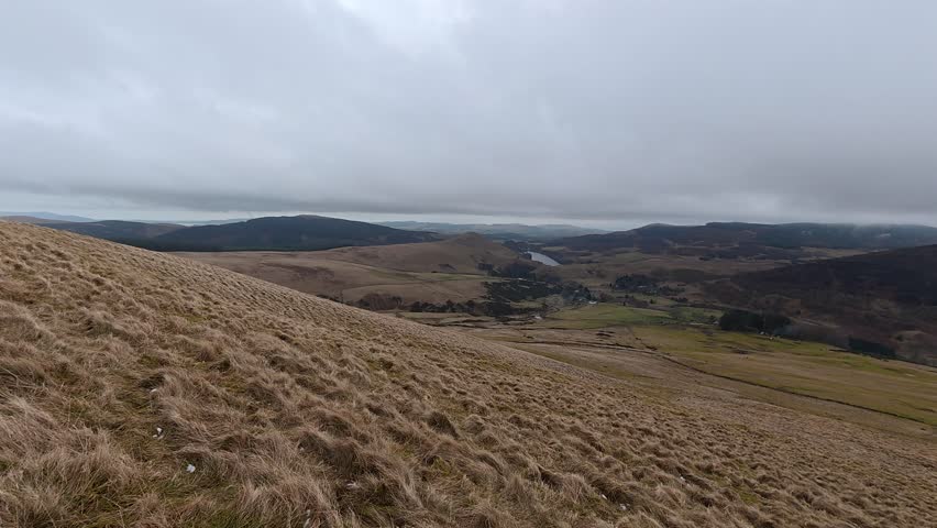 Glen Devon landscape views in Ochil Hills near Glendevon, Scotland, featuring valley glen, reservoirs, rolling hills, and rural woodland terrain.