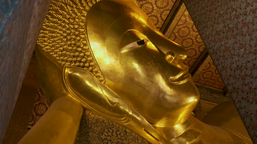 Golden Big Buddha statue in Wat Pho Temple in Bangkok city, Thailand, Asia. Temple of the Reclining Buddha. Popular tourist landmark