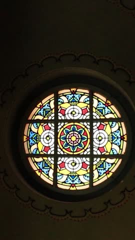 Cinematic shot of the rose window at the historic Novi Sad Synagogue.