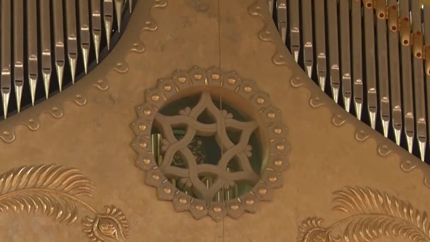 Ornate Star of David inlaid in wood panel detail in Novi Sad City Hall