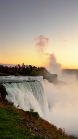 Niagara Falls, New York, USA from the rim of the falls on an autumn dusk.