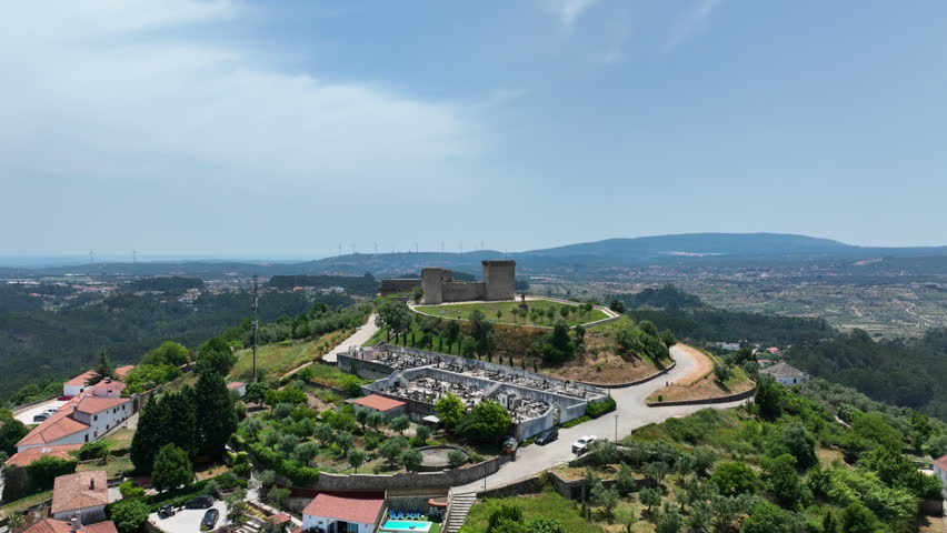 Aerial view over and around the Castle of Ourém, sunny day in Portugal