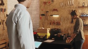 Designer using augmented reality technology on a tablet to create a project in a workshop - Powered by Shutterstock - Get 15% off with code: PIKWIZARD15