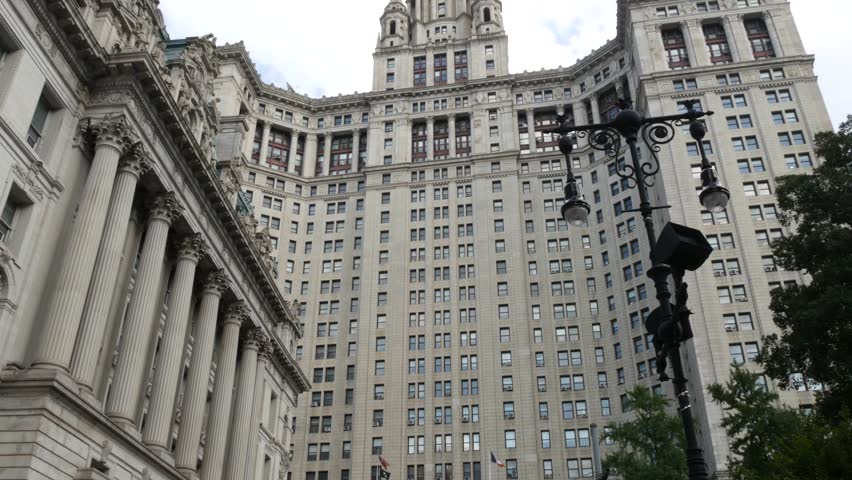 New York City Downtown Civic Center, United States of America. Manhattan municipal building 1914, old historic architecture. Government administration authority. Low angle view from Chambers street.