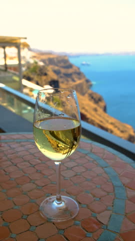 Greek salad and wine in Greece in a restaurant. Selective focus.