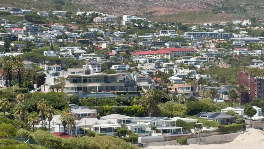 Houses up against a mountain. Camps Bay, Cape Town, South Africa.