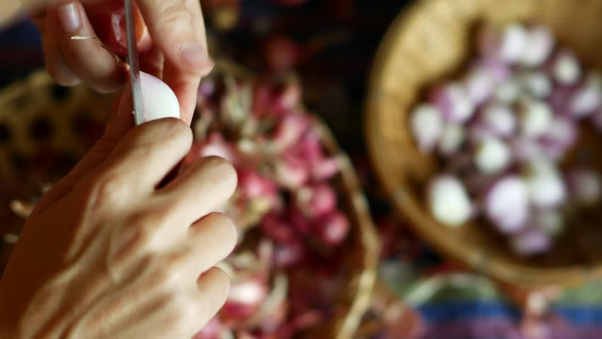 Cleaning Small Purple Onions: Kitchen Prep Close-Up