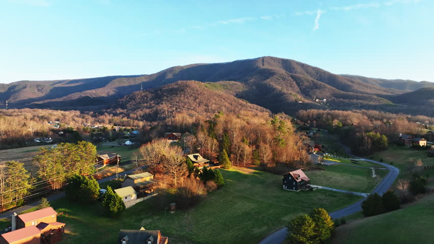 Clear Blue skies during a drone flight through Appalachia showing off the beauty of the Wears Valley and the Great Smoky Mountains
