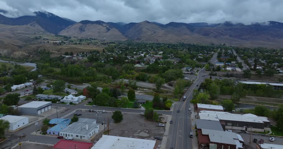 View toward Salmon Idaho with tree lined streets and mountain range beyond