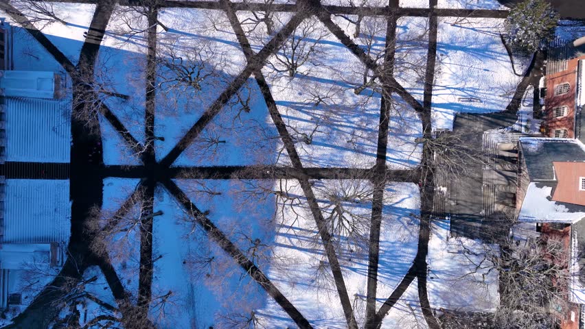 Old Harvard Yard aerial view in winter including Memorial Hall, Memorial Church, Widener Library and University Hall in historic center of Cambridge, Massachusetts MA, USA. 