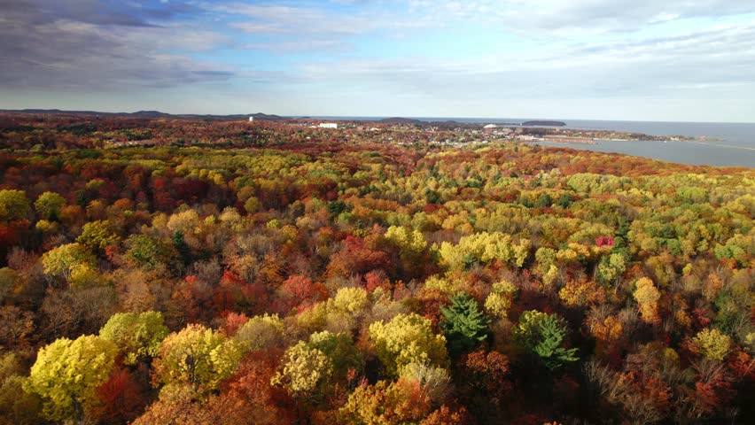 Autumn drone shot over Lake Superior and the small hamlet of Marquette.