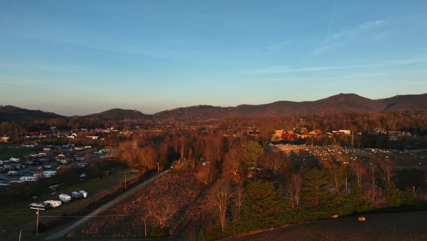 Sunrise gives way to clear blue skies during an early morning drone flight near the Great Smoky Mountains of Appalachia.