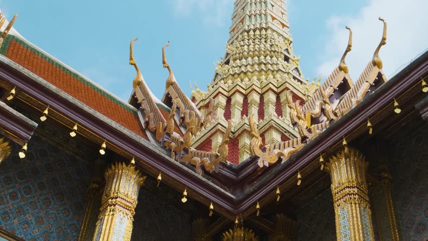Wat Phra Kaew, Temple of the Emerald Buddha, the most sacred Buddhist temple located inside Grand Palace, Bangkok, Thailand. Traditional Buddhist architecture and cultural heritage in Asia