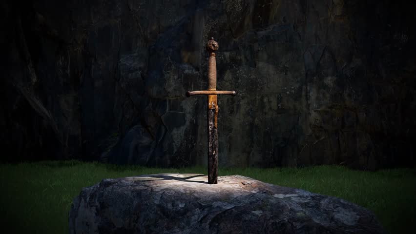 Close-up of the legendary sword in the stone under a spotlight at night, highlighting myth, medieval legend, and magical or historic symbolism.