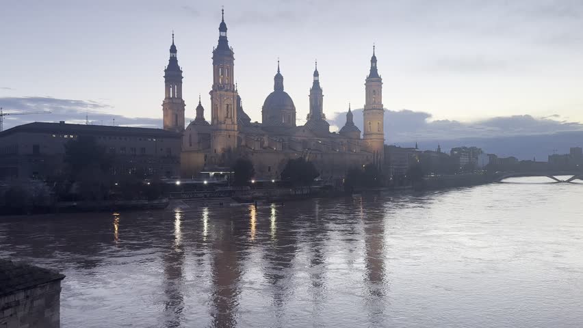 Zaragoza, Spain – Sunset Panoramic View of Basilica del Pilar and Ebro River from Puente de Piedra