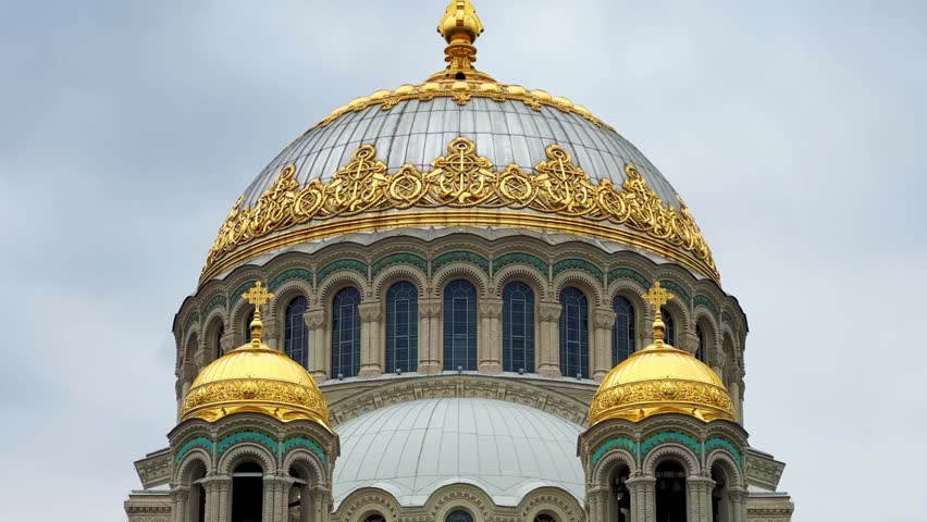 KRONSTADT, Russia - September 14, 2024: St. Nicholas Naval Cathedral. The Kronstadt Naval Cathedral on Yakornaya Square in cloudy weather in autumn. Autumn Kronstadt. Kotlin Island. 4K