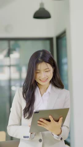 Female accountant working on financial investment on calculator, calculation, analysis of company income.