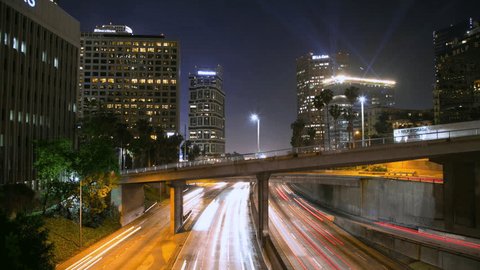 LOS ANGELES city skyline buildings traffic timelapse at night