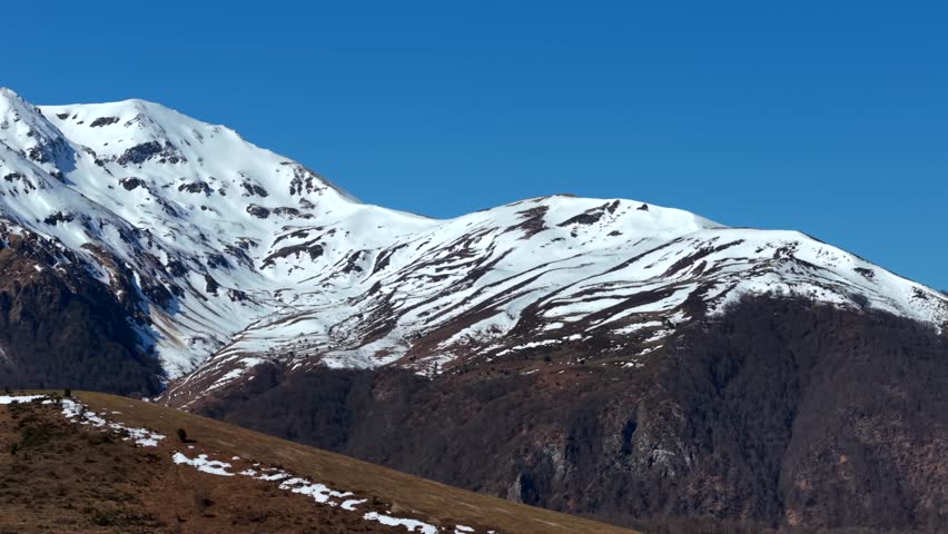 Aerial view of snowy mountains, France.