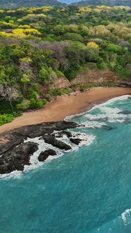 Aerial view of rocky beach and cliffs, Costa Rica.