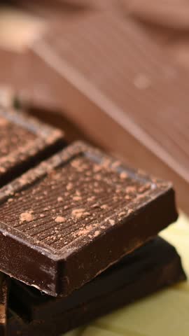 Assortment of white, milk and dark chocolate pieces