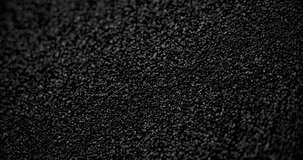 Slow diagonal shift of the background with asphalt texture. - Powered by Shutterstock - Get 15% off with code: PIKWIZARD15