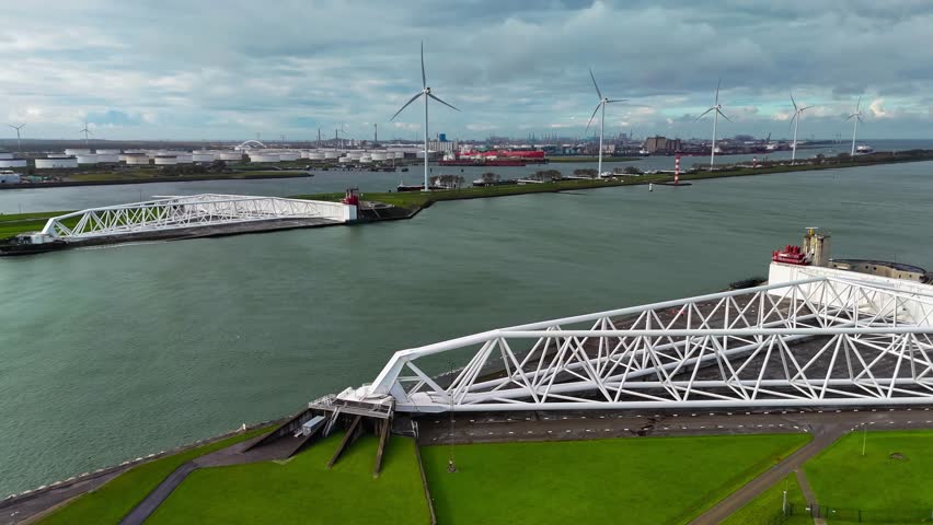 The Maeslantkering, or Maeslant barrier, is a storm barrier in the Rhine Delta in the Netherlands for flood protection. It is one of the largest moving structures on Earth. High quality 4k footage