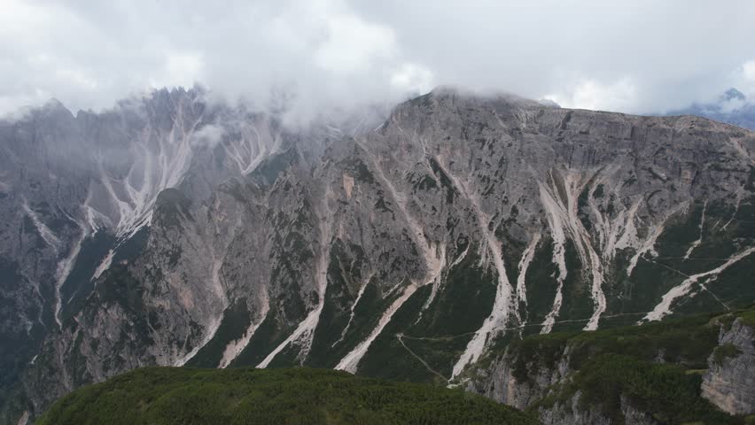 Aerial view of mountains with clouds, Italy.