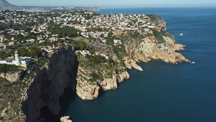 Drone aerial view of Cabo de la Nau lighthouse, Spain
