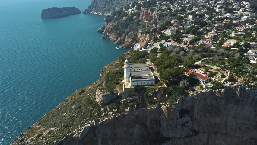 Drone aerial view of Cabo de la Nau lighthouse, Spain
