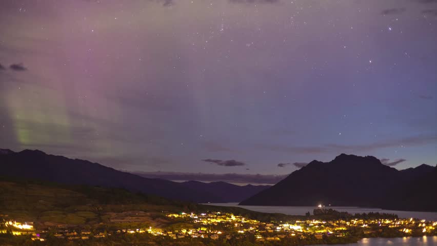 Beautiful natural landscape featuring dramatic sky colors and distant mountains under glowing atmospheric light. Peaceful nature scenery symbolizing wilderness, environmental beauty, outdoor exploration, and calm natural atmosphere.