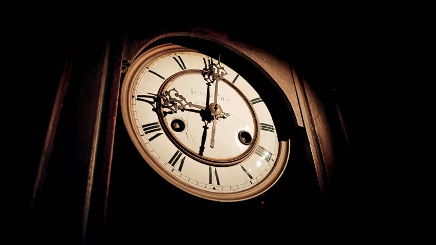 Time lapse of vintage wall clock with pendulum