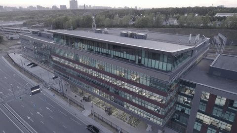 Drone Descending beside Moscow Business Center Sunset