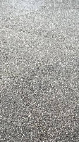 A aggregate driveway getting hit with hail