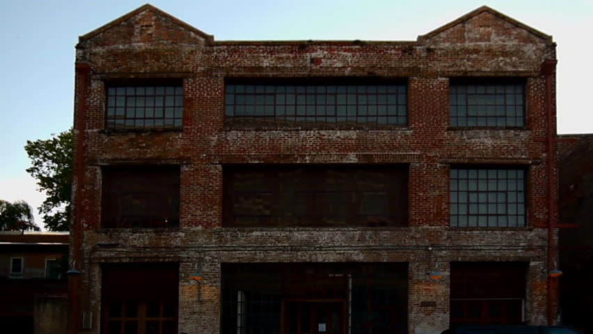 New Orleans, Louisiana -  June, 2011 - Large brick wall building along St. Joseph Street.
