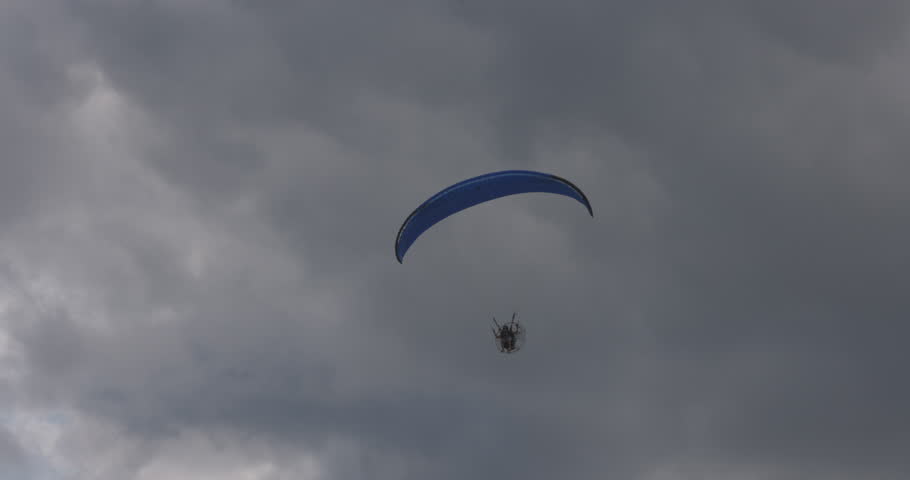 Powered Paraglider on cloudy day